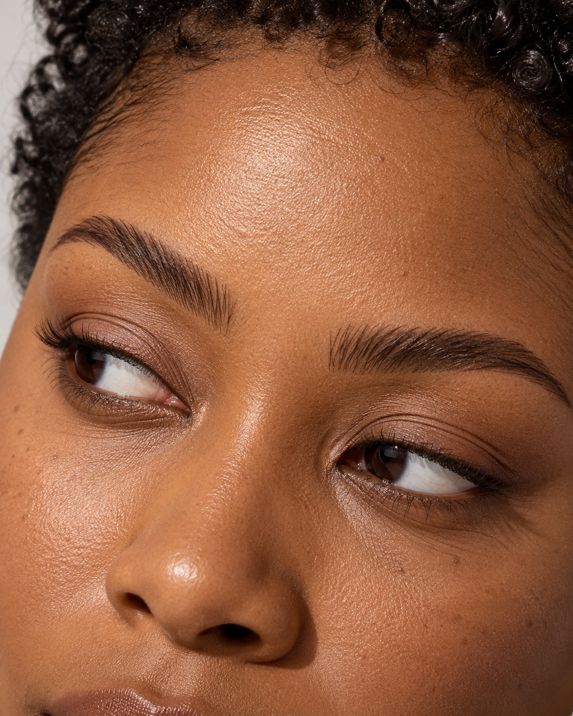 Close-up look with feathered, textured brows