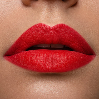 Model smiling with warm terracotta lip liner look