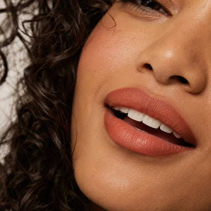 Classic red matte lip liner look, close-up of full lips