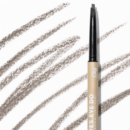 Close-up of the dual-ended brow pencil showing the angled tip and spoolie brush