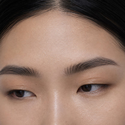 Shadow Granite shade on model: cool grey-brown taupe brows in close-up